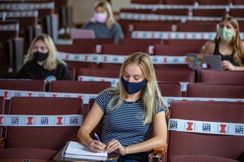 Students take part in a lecture class in Greg Hall. With the semester opening with COVID-19 precautions in place, students are distanced, masked and can not gain entry to the buildings without showing a building pass showing a recent negative COVID-19 test.